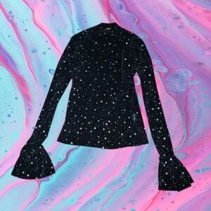 Juniors size medium sheer black mesh like top with stars all over